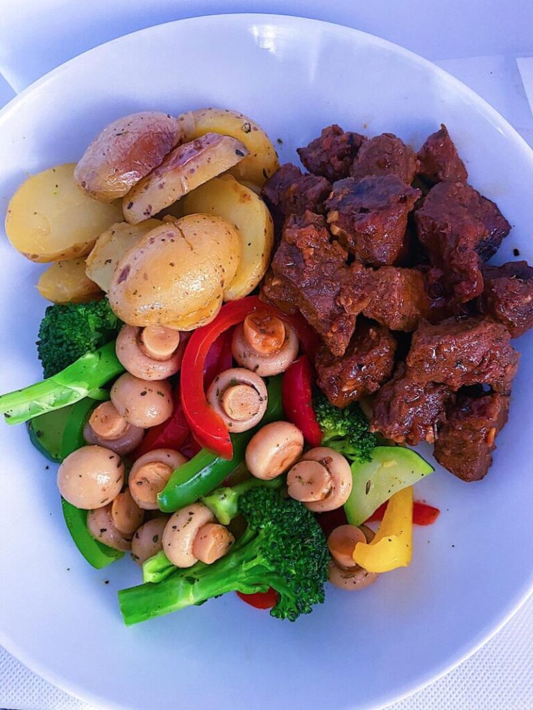 Oven Roasted Steak, served with roasted potatoes and mixed sautéed vegetables